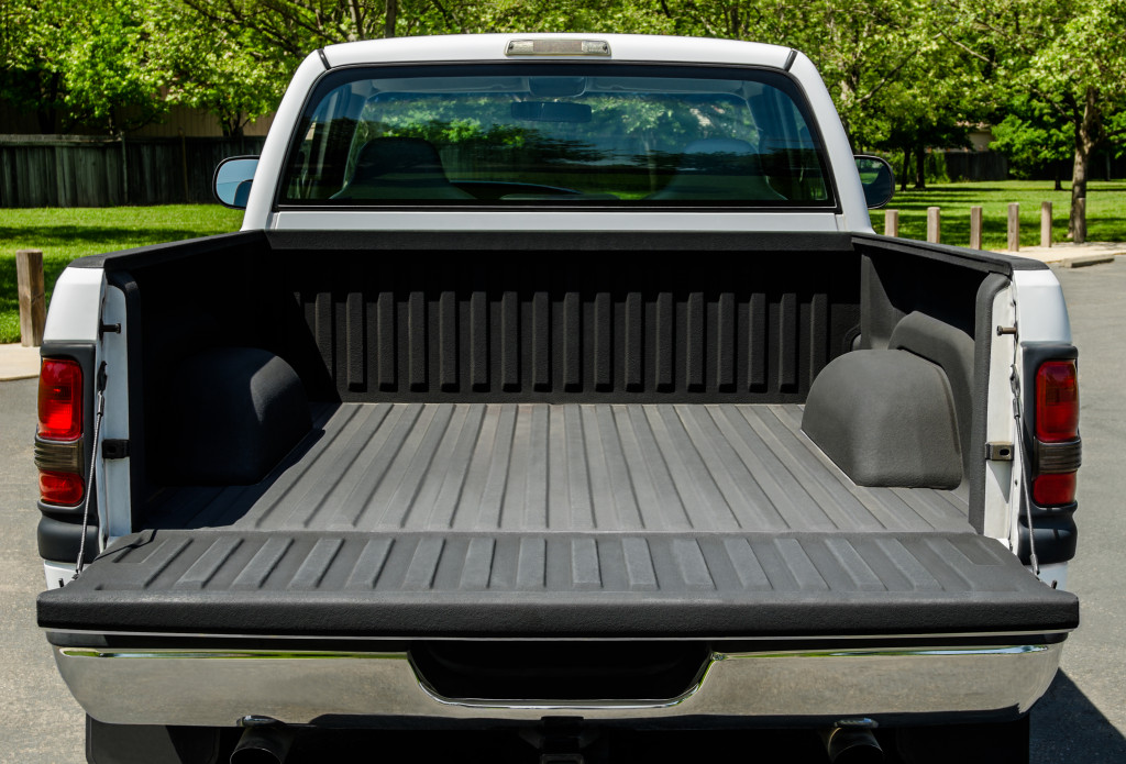 Pickup truck bed with a liner on it.